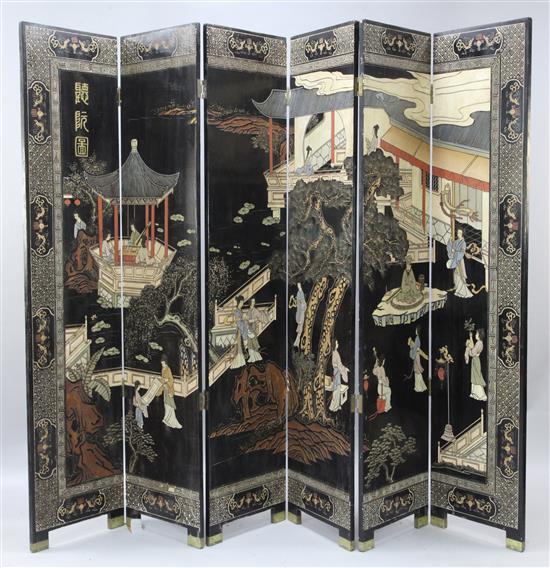 A Japanese black lacquered six fold dressing screen, W.1ft 4in. H.6ft